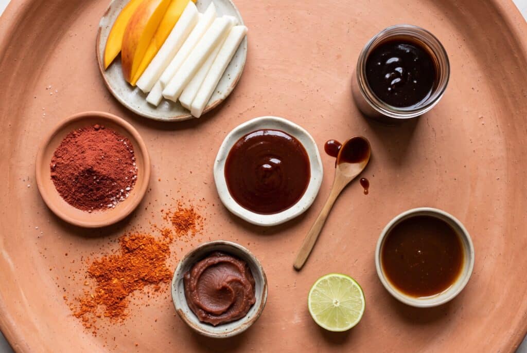Chamoy substitutes: tamarind concentrate, li hing mui powder, umeboshi paste and plum sauce